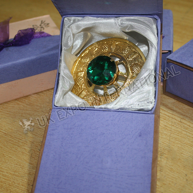 Emerald Stone With Gold Brooch